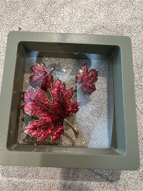 Red maple brooch and pierced earring set. Excellent condition